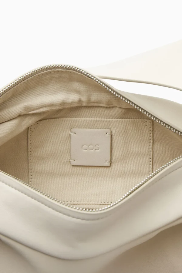 COS SWING CROSSBODY - LEATHER CREAM Store